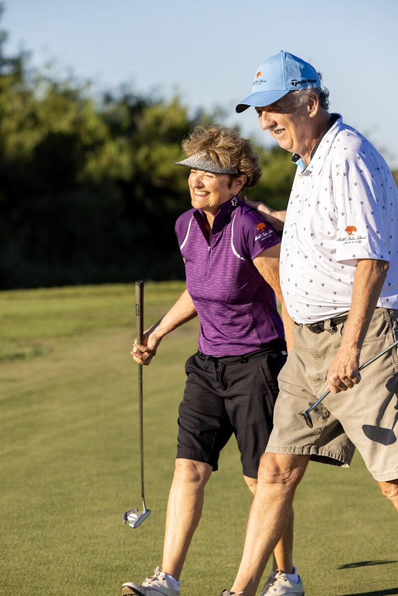 Couple plays golf at SPI Golf Club