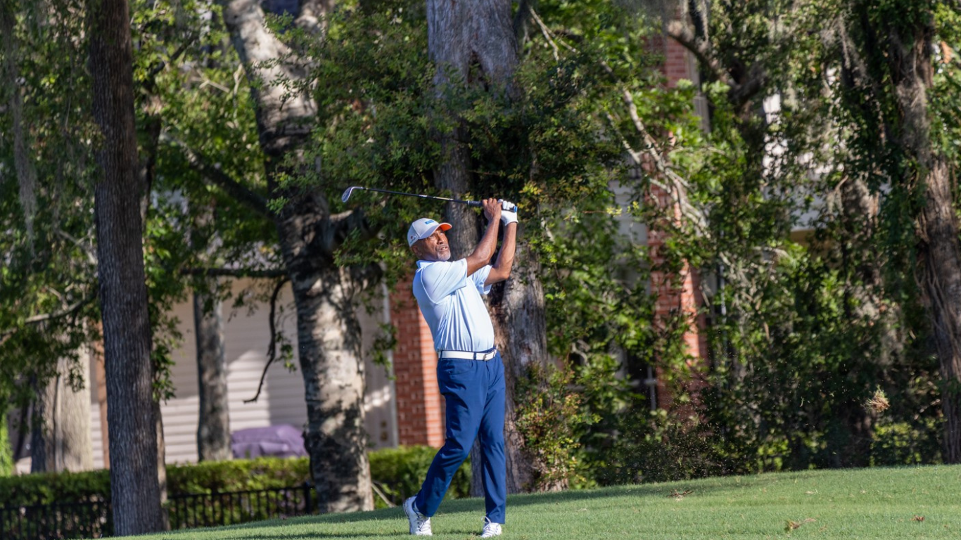 Jessie Hodge swinging a golf club at Bay Oaks