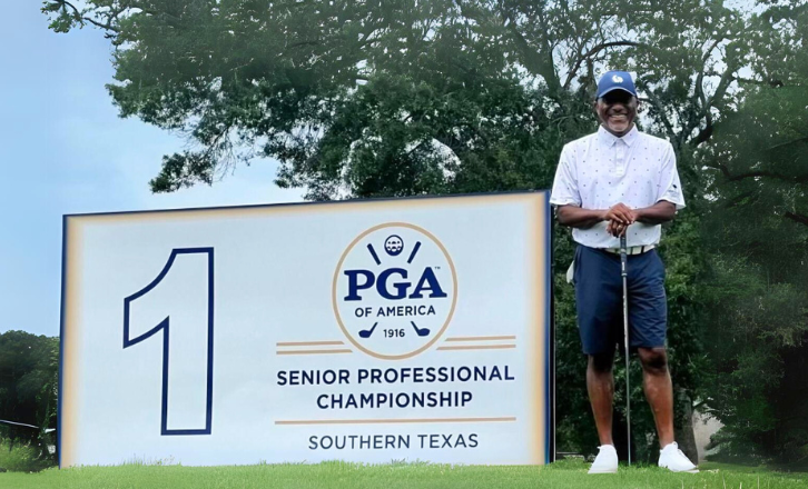 Jessie Hodge PGA Professional with PGA Senior Professional Championship sign